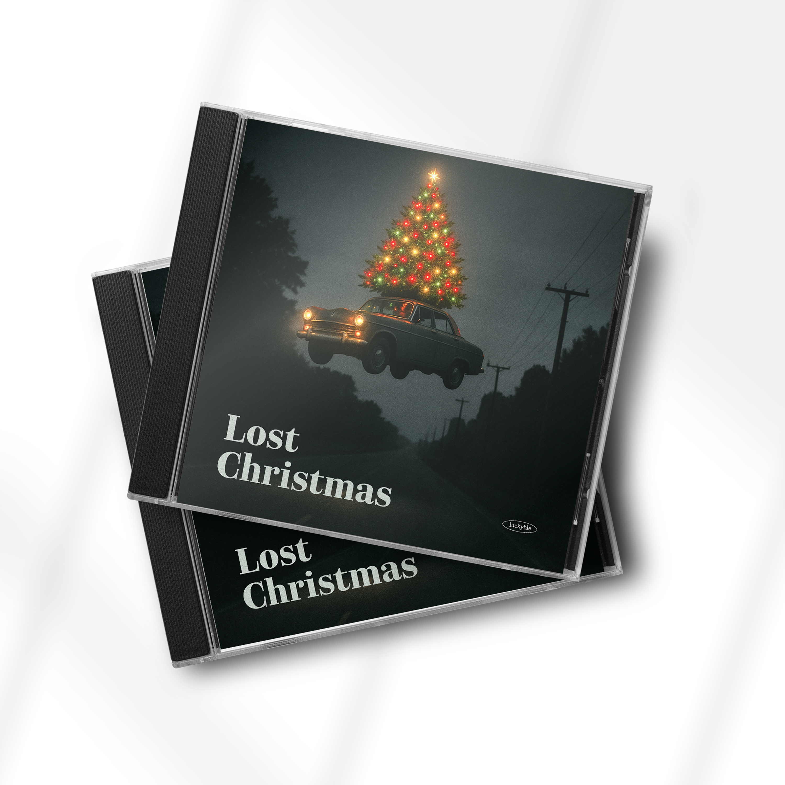Lost Christmas 공중에 떠 있는 차와 트리 연출 앨범커버 이미지